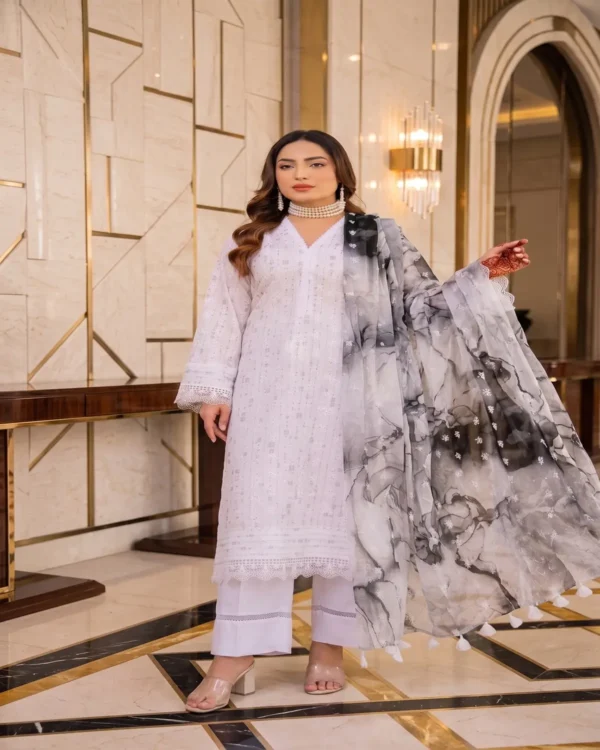 Make_picture_in_4_5_ratio_202608230206 (1) ChicZiba Kumash Luxury Embroidered Lawn 3-Piece Suit – Design 94, Vol 22